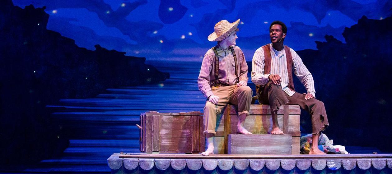 Two students playing Huckleberry Finn and Jim in Big River