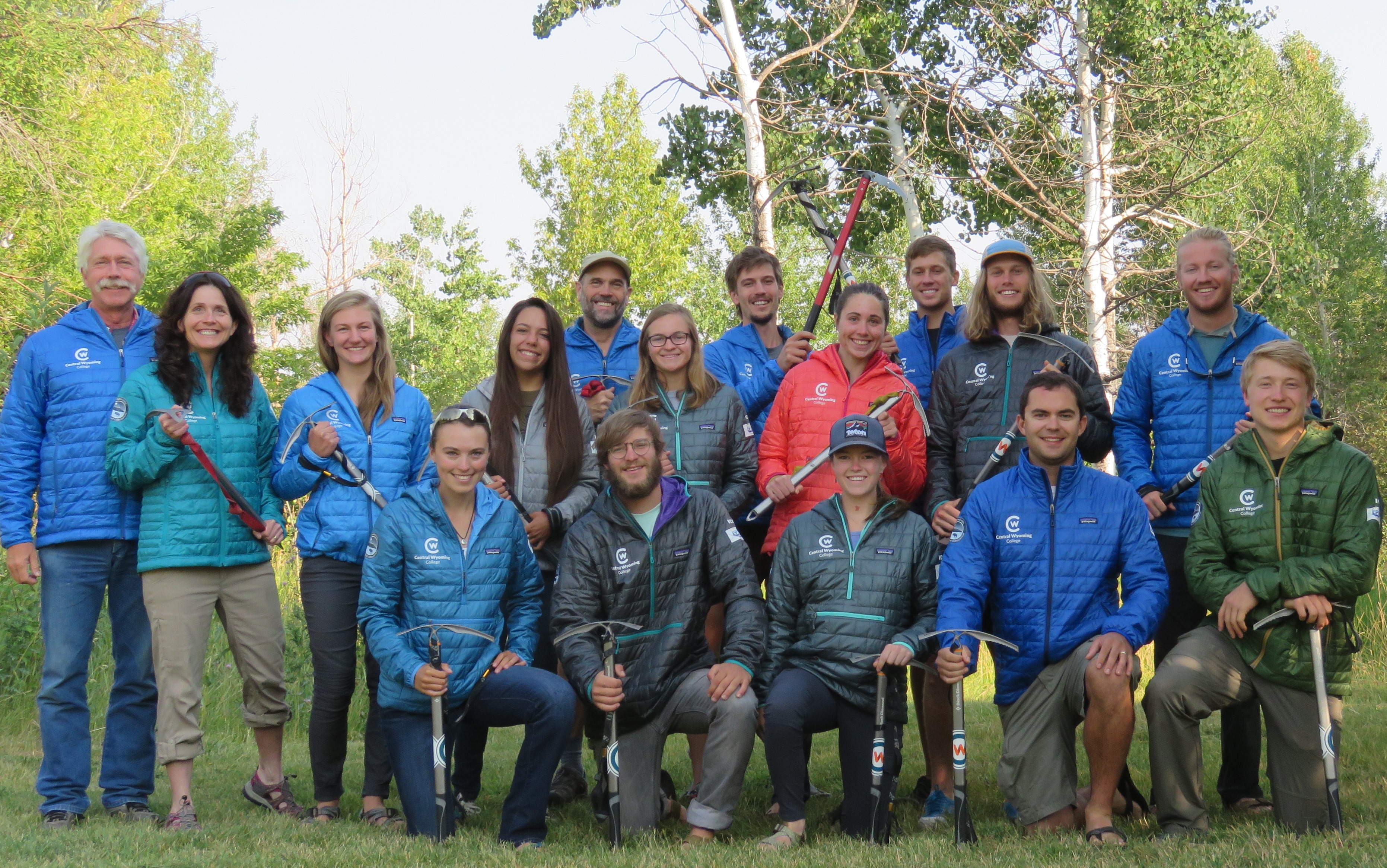 A team of students pose before heading into the Wind River mountains to study the Dinwoody Glacier