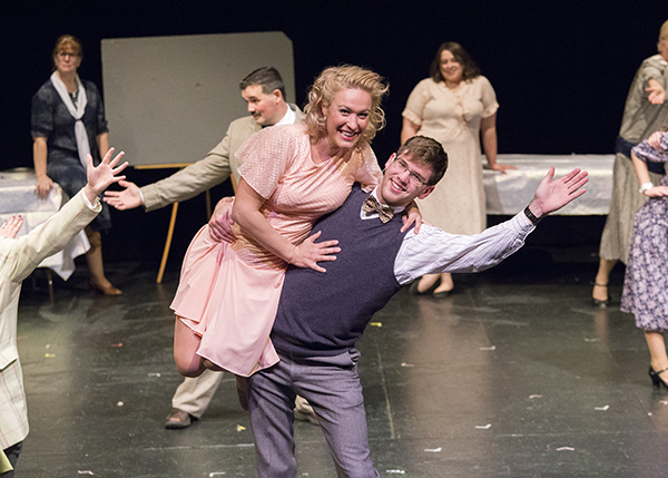 Cast of It's a Wonderful Life dancing on stage