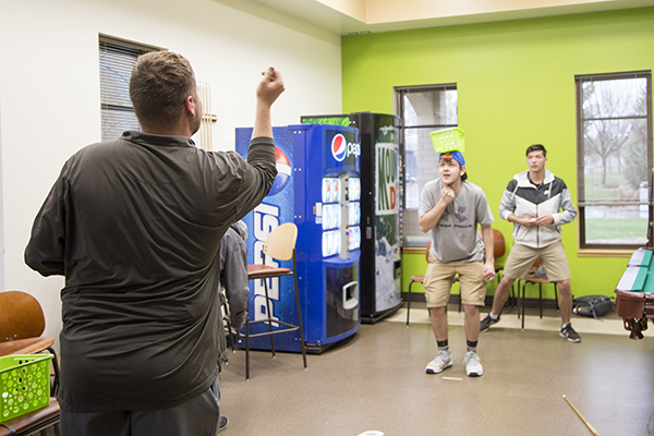 Students playing a game at CWC graduation party