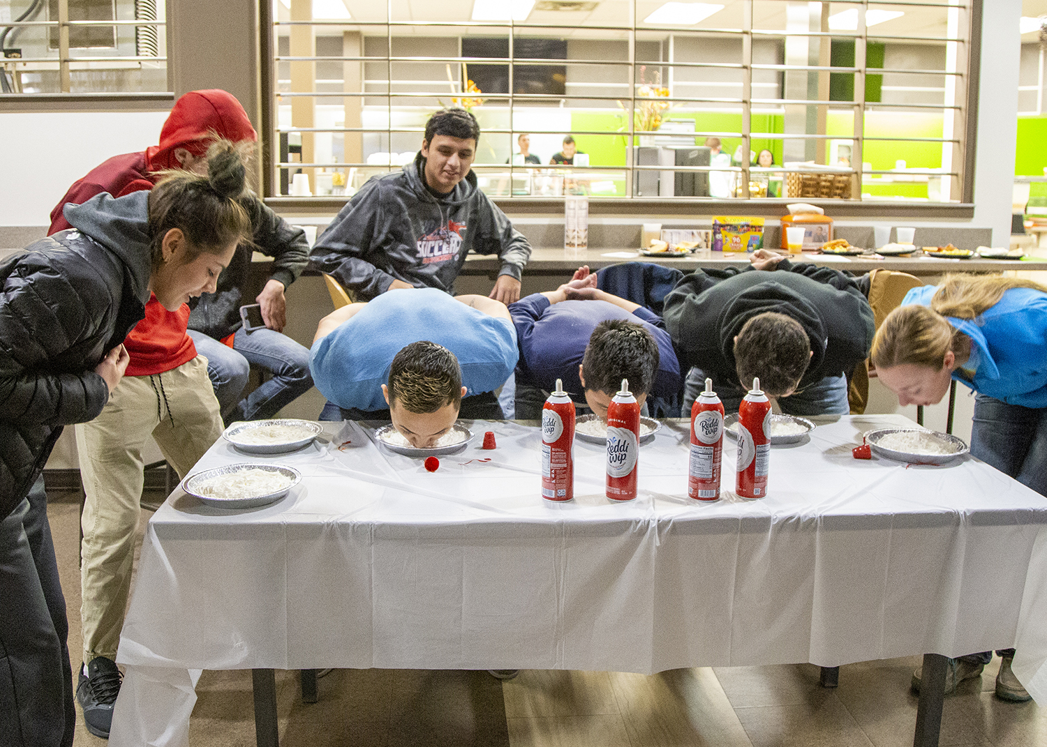 Students competing in a pie eating contest