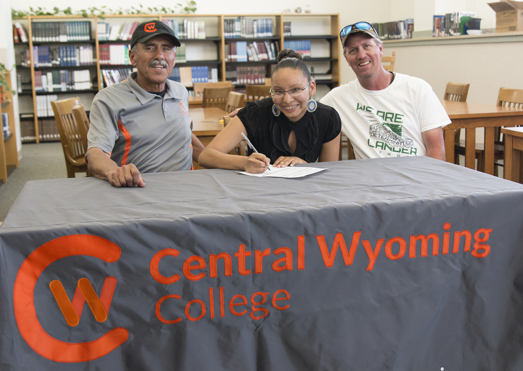 Chelsea Badhawk, Coach Al Lara, and LVHS Cross Country Coach