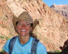 portrait of Shelli Johnson with mountains rocks in the background