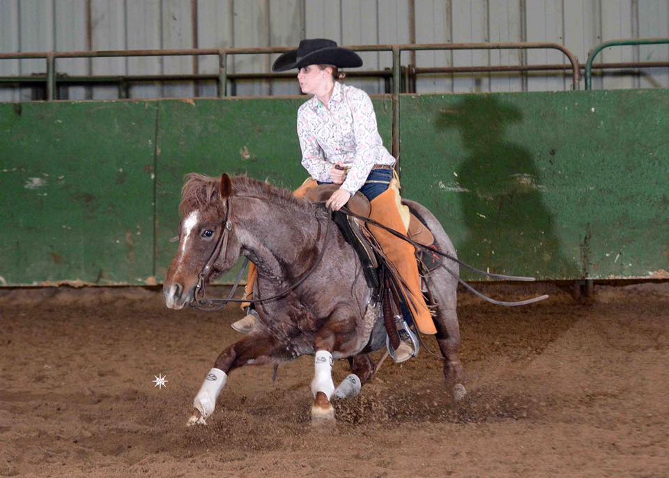 Amy Strickland riding her horse